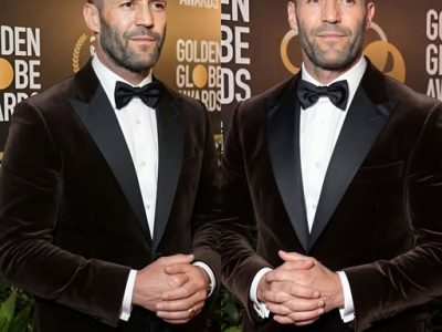 Jason Statham wearing a brown velvet tuxedo jacket and black bow tie at the 67th Annual Golden Globe Awards red carpet in image_ae495c.jpg